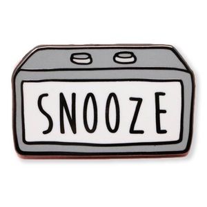 “Snooze” grey alarm clock pin